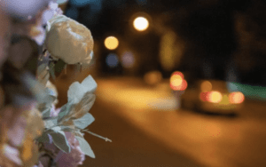 Flowers have been placed near a dangerous road after a traffic fatality. The Ryan Law Group shares the 10 deadliest days of the year to be on the road.